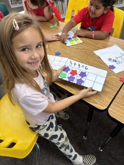 Student doing a math puzzle.